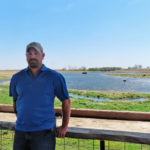 Heath Stolee of Nutty Farmer Chestnuts by his wetland in Radcliffe, Iowa