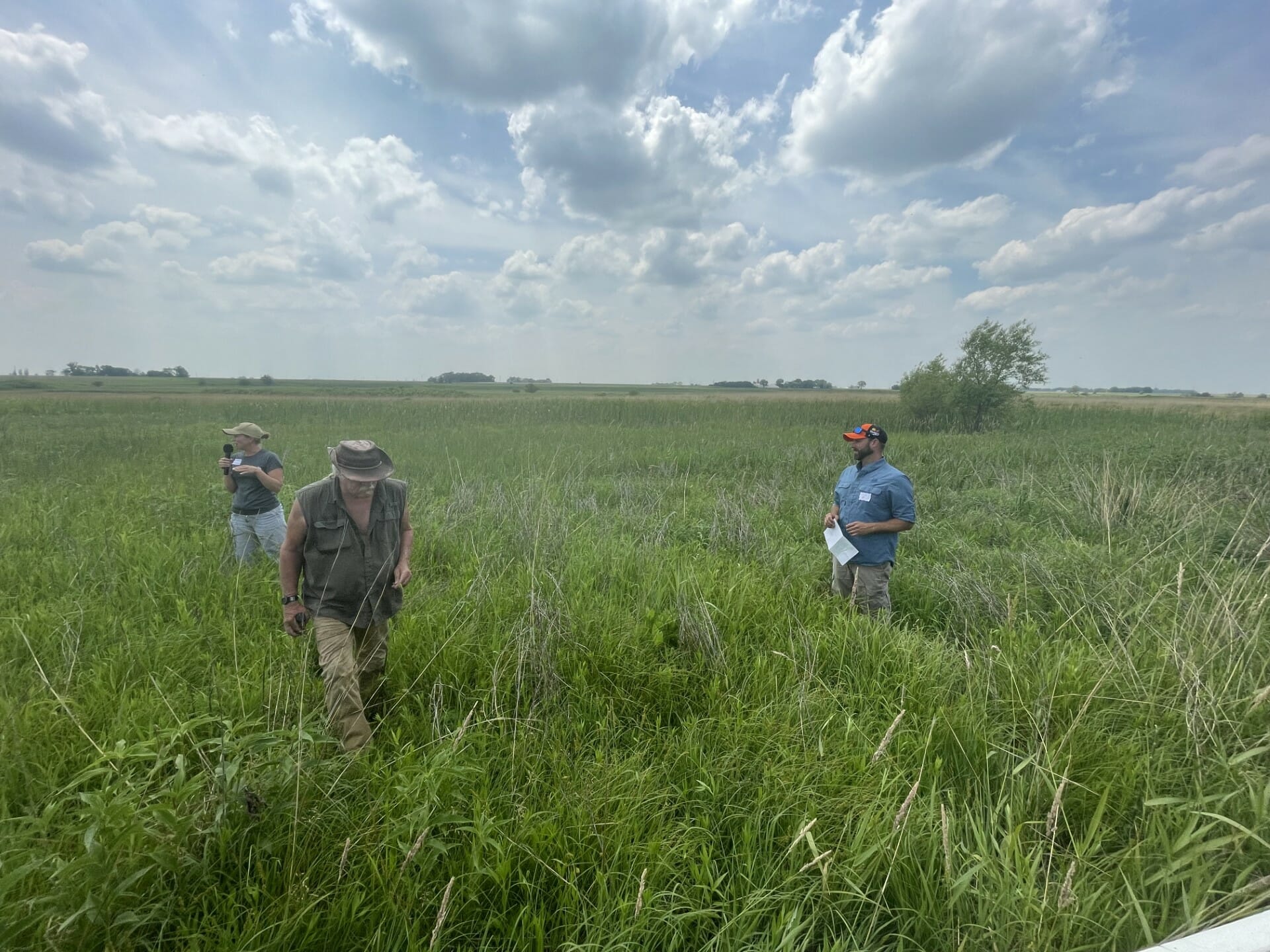 Stephanie Nelson and Josh Divan of Pheasants Forever along with Dwight Rutter at Prairie Flower