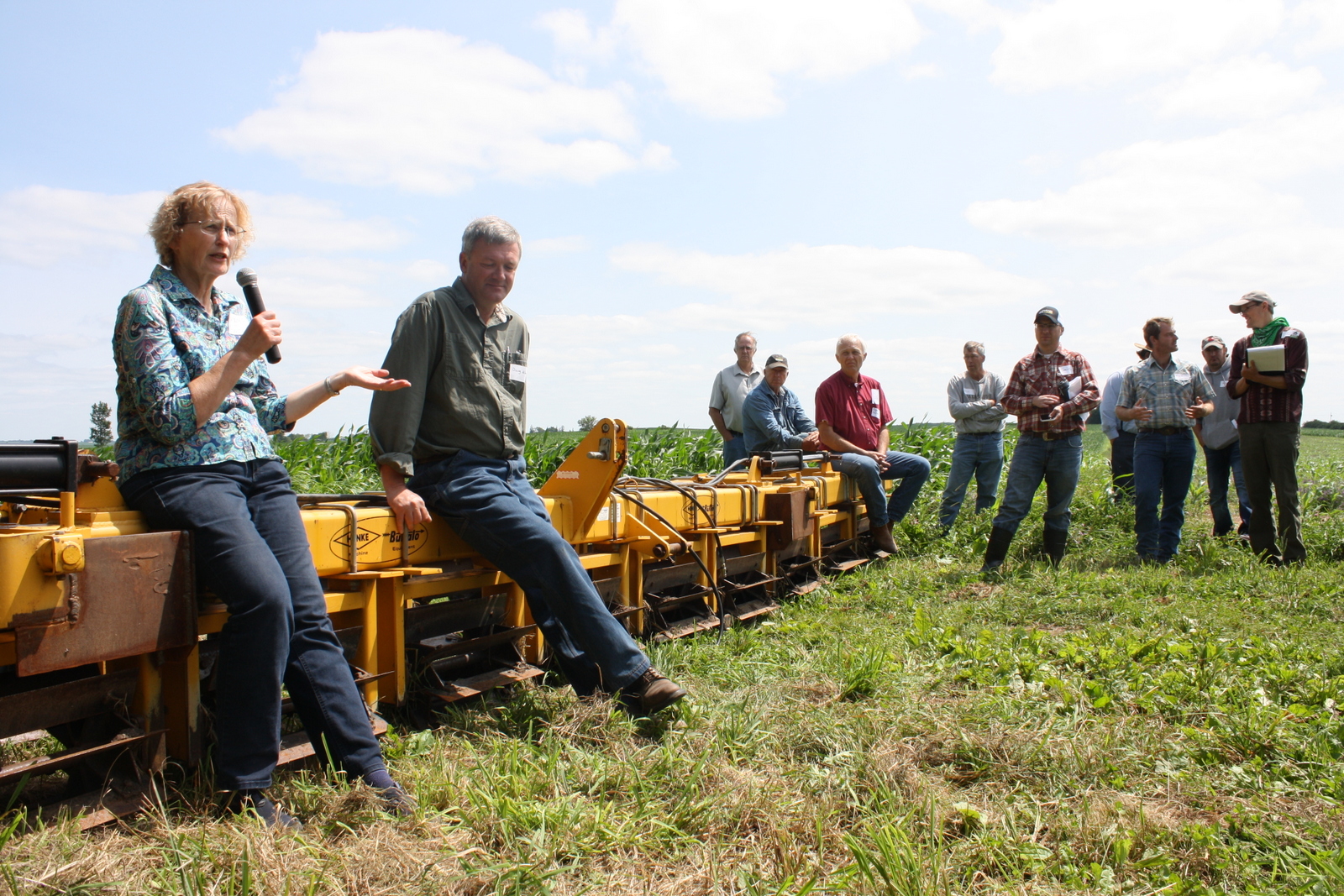 Margaret Smith and Doug Alert, of Ash Grove Farm, discuss organic crop production and cover crops at a field day they hosted.