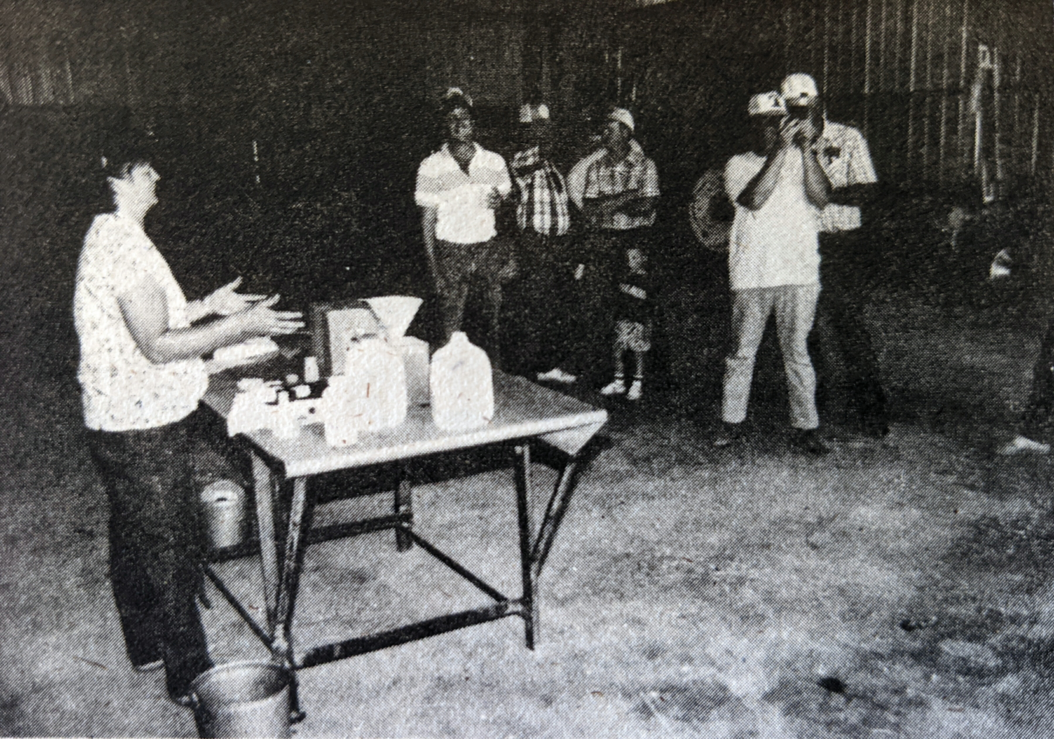Cindy Madsen shows how to use the nitrate test kit to take their own readings from Winter 1990 PFI newsletter