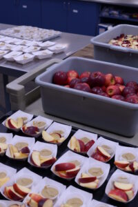 Locally grown apples being prepared for kids