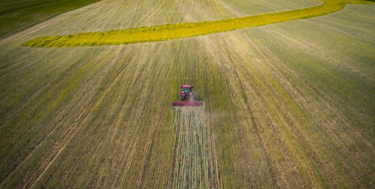 Photo 1 Abels Tractor roller crimping to terminate cereal rye