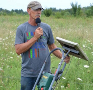Russ Wischover speaking at his 2017 PFI field day