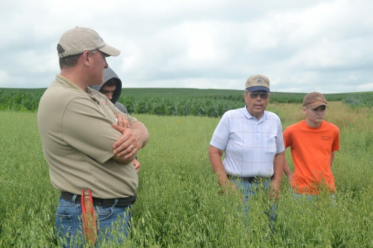 Paul Ackley lends some advice at David Carbaugh's field day.
