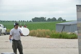 David Ausberger kicks off his field day at his farm near Jefferson.