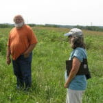 Phil Specht, Dan's brother, and Mary Damm, the new owner of Dan's farm near McGregor