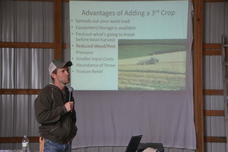Bill Frederick explaining why they like to raise small grains on their farm.