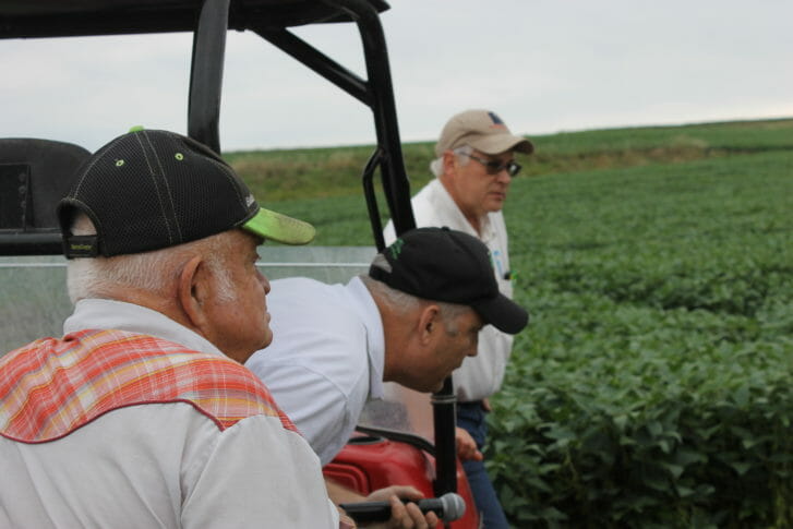 Axel Larson, Rick Bednarek, and Mark Peterson check out a soil pit.