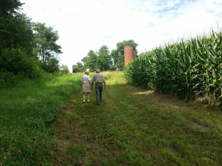 Steve and Maggie walk up the path