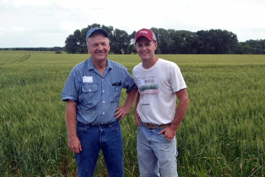 Nathan and his dad Randy. Nathan thanked his dad throughout the field day for the opportunity to experiment with new methods on the farm.