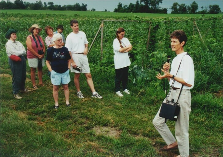 Angela Tedesco (far right) presents at a PFI field day in the late 1990s.